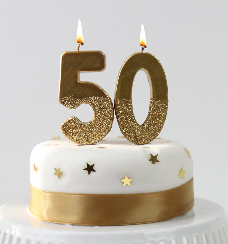 Birthday cake with 59 number candle on blue backgraund set on fire by  lighter. Close-up Stock Photo by ©Stasonych 338929898